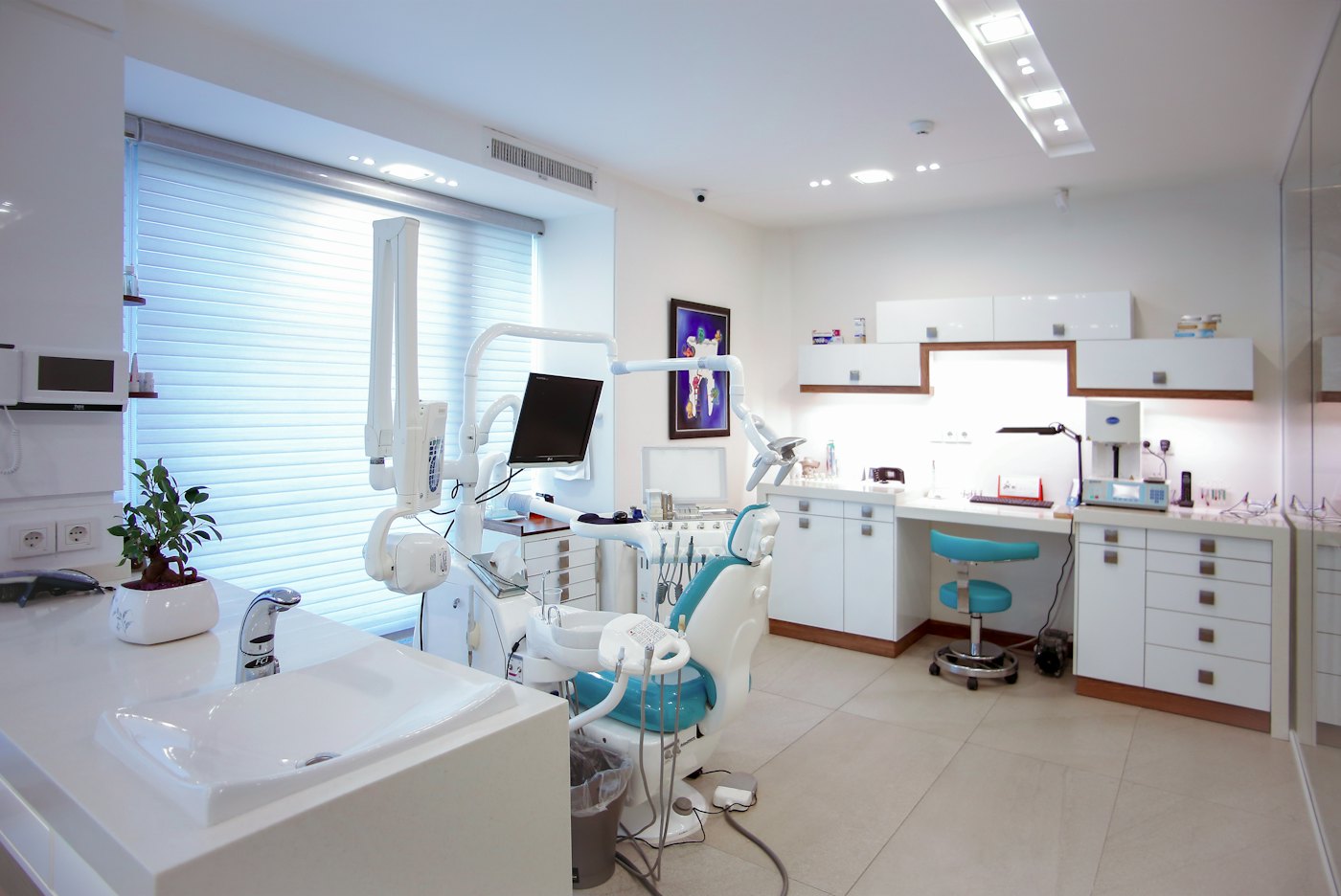 Sample photo: a bright, modern dental clinic with treatment chairs