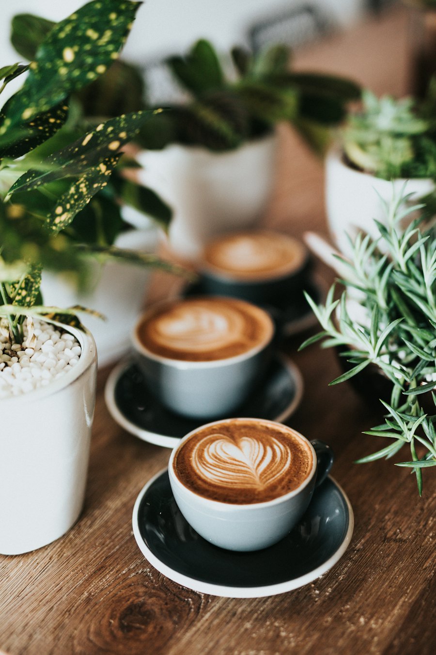 Sample photo: two lattes on a wooden table