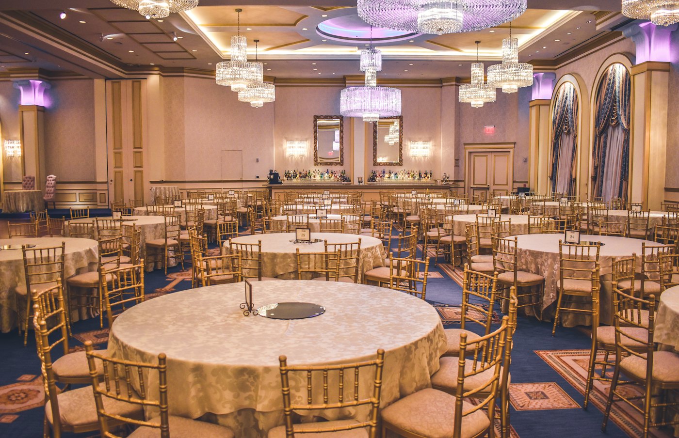 Sample photo: an elegant events hall with round tables