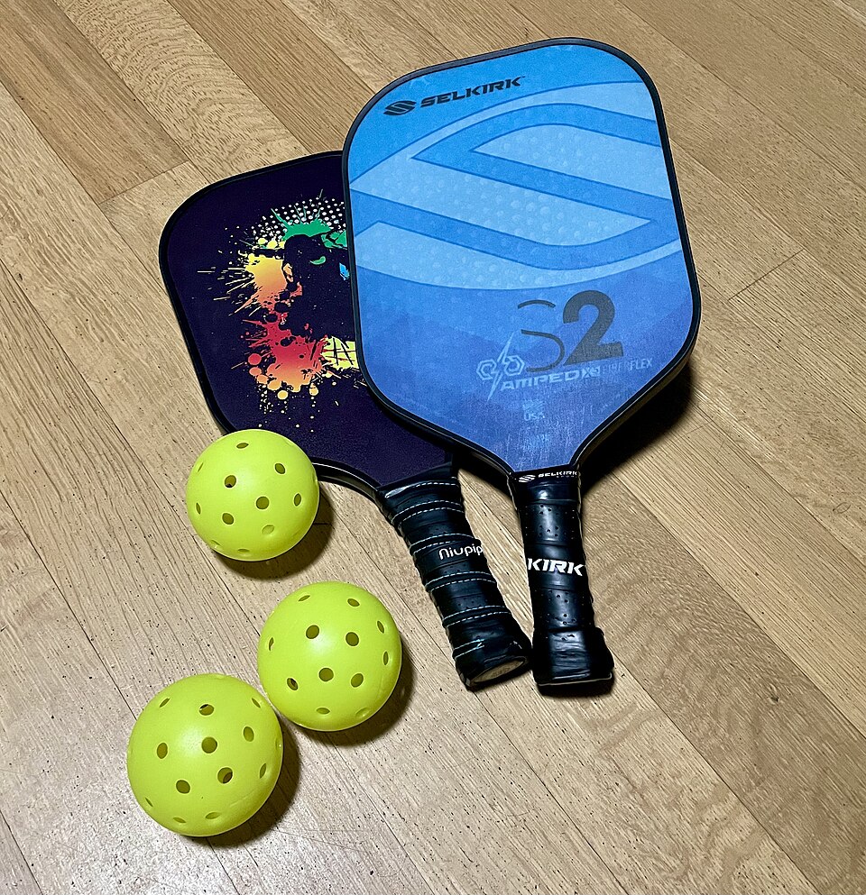 Sample photo: pickleball paddles and balls